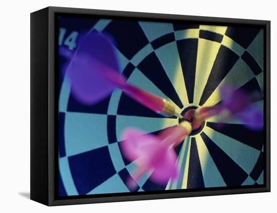 Close-up of Three Darts in the Bull's-Eye of a Dartboard-null-Framed Premier Image Canvas