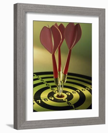 Close-up of Three Darts in the Bull's-Eye of a Dartboard-null-Framed Photographic Print