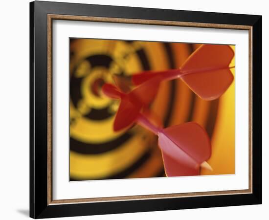 Close-up of Three Darts in the Bull's-Eye of a Dartboard-null-Framed Photographic Print