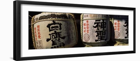 Close-up of Three Dedicated Sake Barrels, Imamiya Temple, Kita-Ku, Kyoto, Honshu, Japan-null-Framed Photographic Print