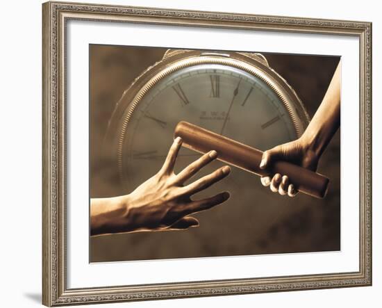 Close Up of Two Runners Hands Passing the Baton in Relay Race in Front of Old European Clock Face-null-Framed Photographic Print