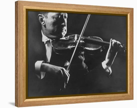 Close Up of Violinist Jascha Heifetz Playing in Mili's Darkened Studio-Gjon Mili-Framed Premier Image Canvas