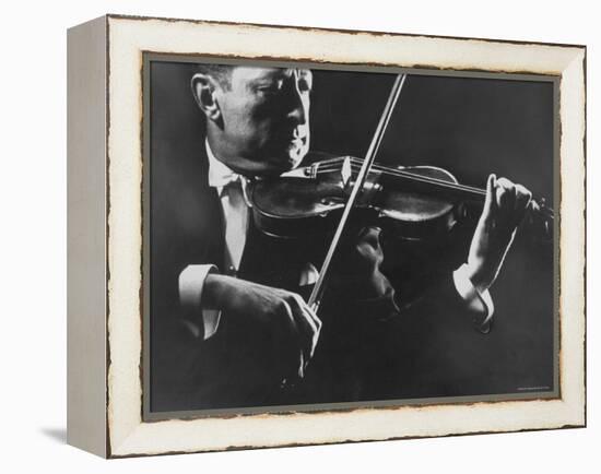 Close Up of Violinist Jascha Heifetz Playing in Mili's Darkened Studio-Gjon Mili-Framed Premier Image Canvas