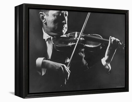 Close Up of Violinist Jascha Heifetz Playing in Mili's Darkened Studio-Gjon Mili-Framed Premier Image Canvas