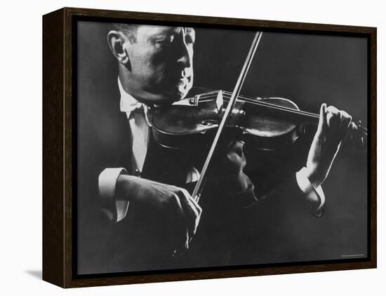 Close Up of Violinist Jascha Heifetz Playing in Mili's Darkened Studio-Gjon Mili-Framed Premier Image Canvas