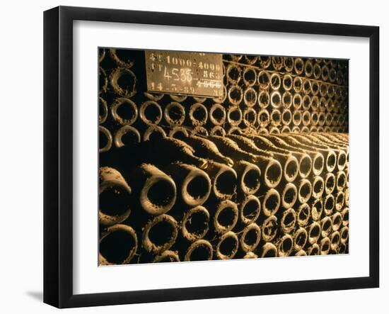 Close-up of Wine Bottles in a Cellar of Bollinger, Ay, Champagne, France-null-Framed Photographic Print