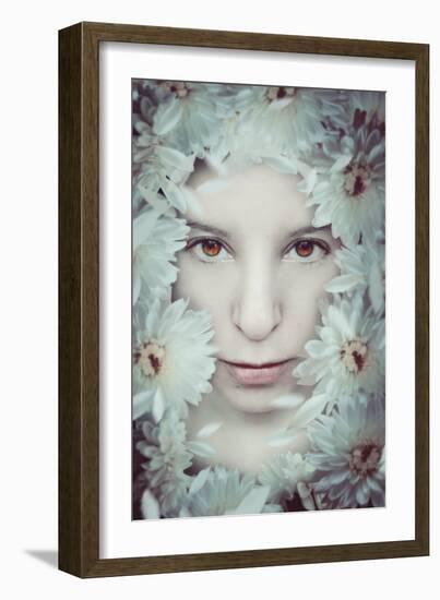 Close Up of Young Girls Face in Flowers-Carolina Hernandez-Framed Photographic Print