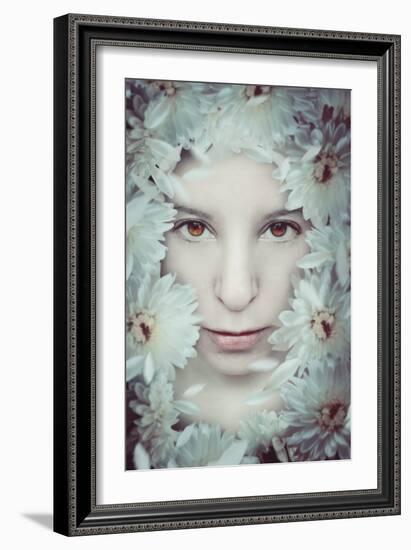 Close Up of Young Girls Face in Flowers-Carolina Hernandez-Framed Photographic Print