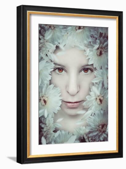 Close Up of Young Girls Face in Flowers-Carolina Hernandez-Framed Photographic Print