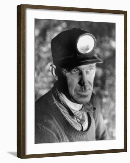 Close Up of Young Mining Foreman of English Descent in Tunnel of the Powderly Anthracite Coal Mine-Margaret Bourke-White-Framed Photographic Print