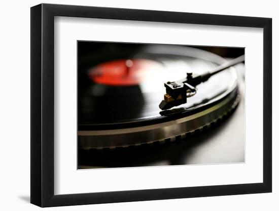 Close up View of Old Fashioned Turntable Playing a Track from Black Vinyl.-graphicphoto-Framed Photographic Print