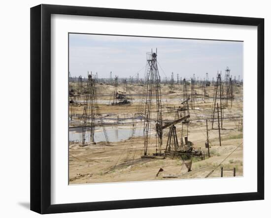 Closely Spaced Drilling Towers and Nodding Donkey Beam Pumps, Ramana Oilfield, Baku, Azerbaijan-Waltham Tony-Framed Photographic Print