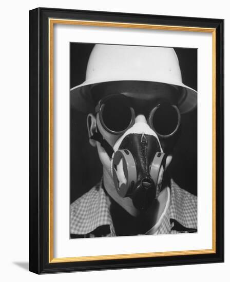 Closeup a A Man Wearing a Safety Helmet, Mask and Goggles-Andreas Feininger-Framed Photographic Print