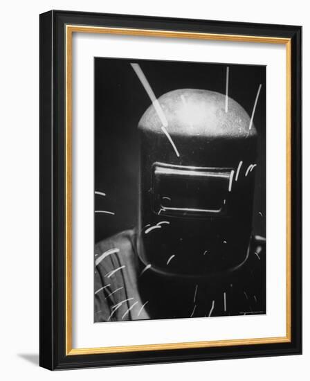 Closeup of a Welder Wearing a Mask-Andreas Feininger-Framed Photographic Print