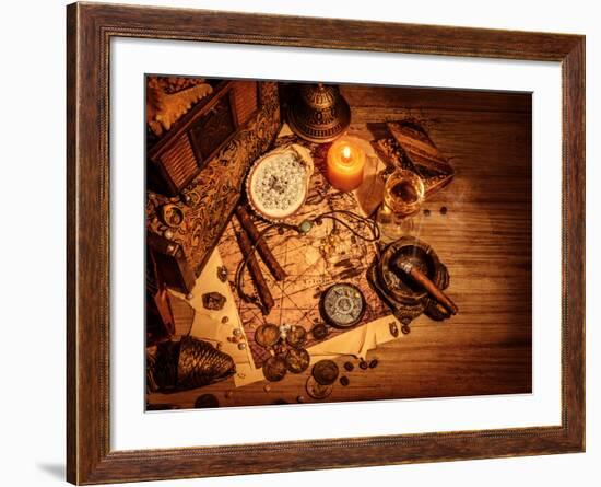 Closeup of Pirates Booty on Wooden Table, Cigars Smoke, Glass of Wine, Map with Way to Search Treas-Anna Omelchenko-Framed Photographic Print