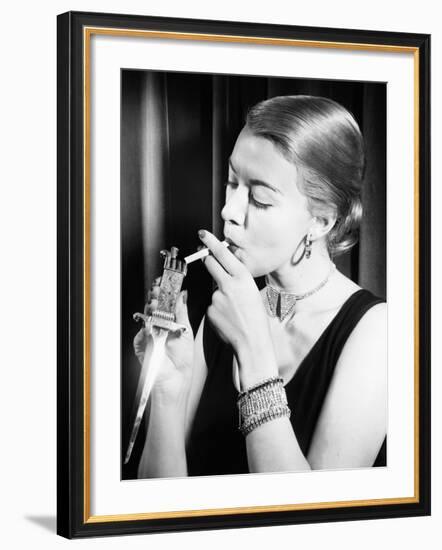 Closeup of Woman Lighting Cigarette-null-Framed Photo