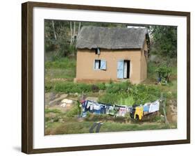 Clothes Drying on a Clothesline in Front of a House, Madagascar-null-Framed Photographic Print
