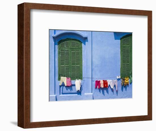 Clothes hung out to dry on a blue wall, Hoi An, Quang Nam Province, Vietnam-Jason Langley-Framed Photographic Print
