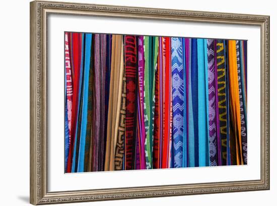 Cloths, Blankets, Scarves, and Hammocks Hang on Display at the Otavalo Market, in Otavalo, Ecuador-Karine Aigner-Framed Photographic Print