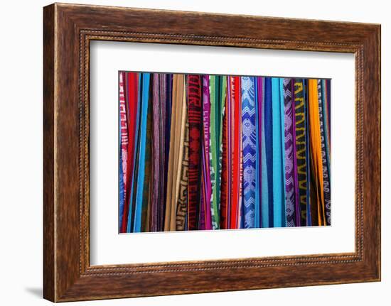 Cloths, Blankets, Scarves, and Hammocks Hang on Display at the Otavalo Market, in Otavalo, Ecuador-Karine Aigner-Framed Photographic Print