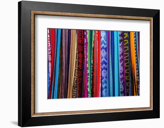 Cloths, Blankets, Scarves, and Hammocks Hang on Display at the Otavalo Market, in Otavalo, Ecuador-Karine Aigner-Framed Photographic Print