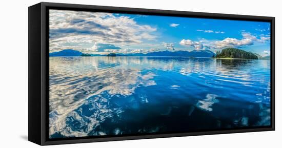 Clouds and sky reflected in the calm waters of the Inside Passage, Southeast Alaska, USA-Mark A Johnson-Framed Premier Image Canvas