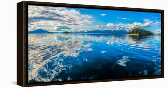 Clouds and sky reflected in the calm waters of the Inside Passage, Southeast Alaska, USA-Mark A Johnson-Framed Premier Image Canvas
