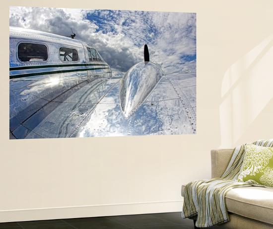 Clouds And Sky Reflecting Off The Shiny Silver Surface Of An Clouds And Sky Reflecting Off The Shiny Silver Surface Of An Airplane Wall Mural By Robbie George Art