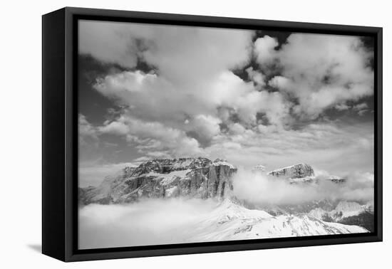 Clouds hang between the mountains of the Dolomites-Jean Schwarz-Framed Premier Image Canvas