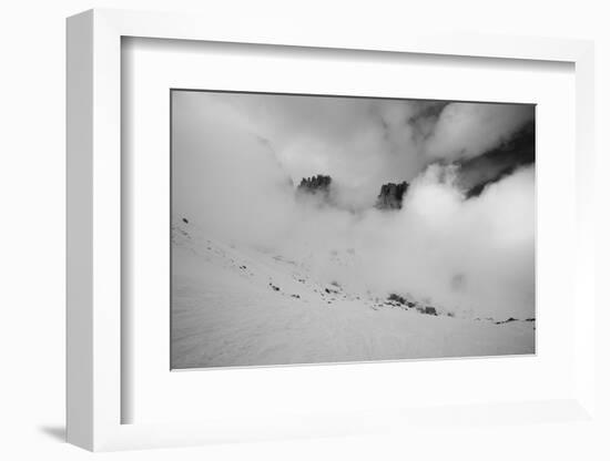 Clouds hang between the mountains of the Dolomites-Jean Schwarz-Framed Photographic Print