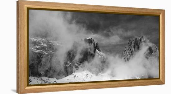 Clouds hang between the mountains of the Dolomites-Jean Schwarz-Framed Premier Image Canvas