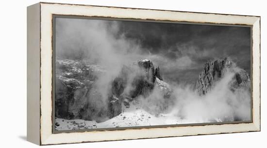 Clouds hang between the mountains of the Dolomites-Jean Schwarz-Framed Premier Image Canvas