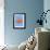 Clown Fish On Blue-null-Framed Art Print displayed on a wall