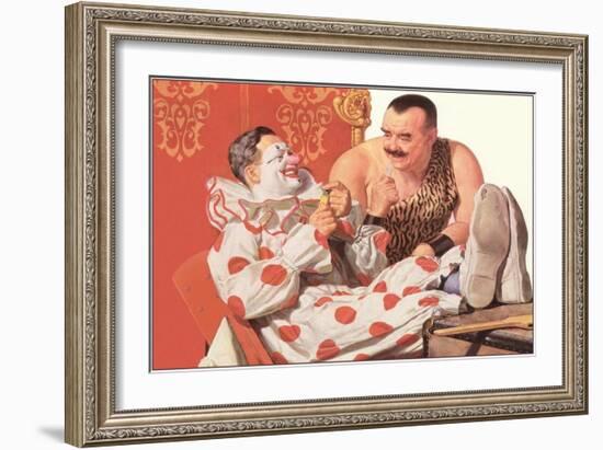 Clown Relaxing with Strongman-null-Framed Art Print