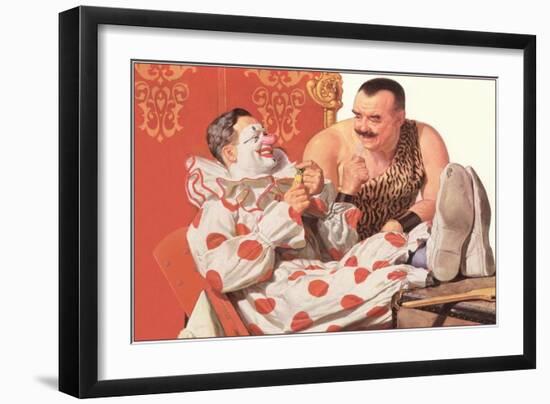 Clown Relaxing with Strongman-null-Framed Art Print