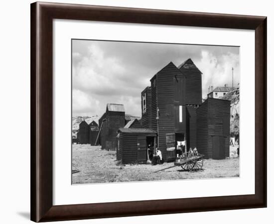 Clustered on the Shingle of the Old Town of Hastings Sussex are These Tall Black Huts-Fred Musto-Framed Photographic Print