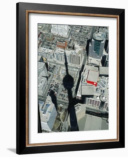 Cn Tower at 533 M or 1,815 Ft High, Canada's Wonder of World, Casting Shadow over Downtown Toronto-Mark Hannaford-Framed Photographic Print