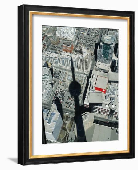 Cn Tower at 533 M or 1,815 Ft High, Canada's Wonder of World, Casting Shadow over Downtown Toronto-Mark Hannaford-Framed Photographic Print