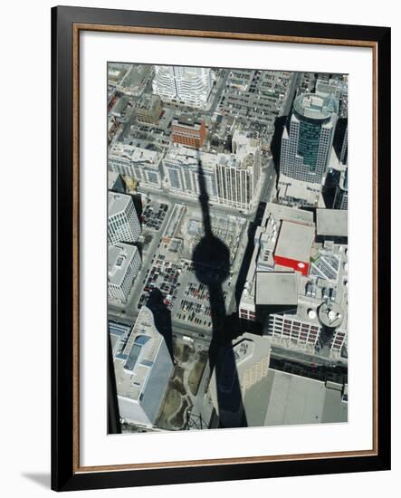 Cn Tower at 533 M or 1,815 Ft High, Canada's Wonder of World, Casting Shadow over Downtown Toronto-Mark Hannaford-Framed Photographic Print