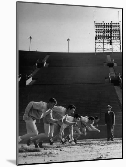 Coach Jess Hill, Leading the Track Team's Practice-John Florea-Mounted Photographic Print