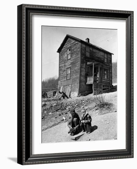 Coal Miner's Boys Playing with Puppy Outside Ramshackle, Two Story House in Dreary Mining Town-Alfred Eisenstaedt-Framed Photographic Print