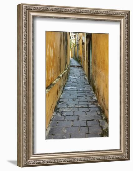 Cobblestones and yellow walls in alleyway, Hoi An, Vietnam-David Wall-Framed Photographic Print