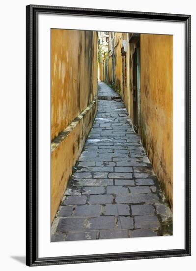 Cobblestones and yellow walls in alleyway, Hoi An, Vietnam-David Wall-Framed Photographic Print