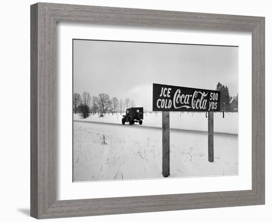 Coca Cola Road Sign on Autobahn Between Munich and Salzburg with Jep Driving-Walter Sanders-Framed Photographic Print