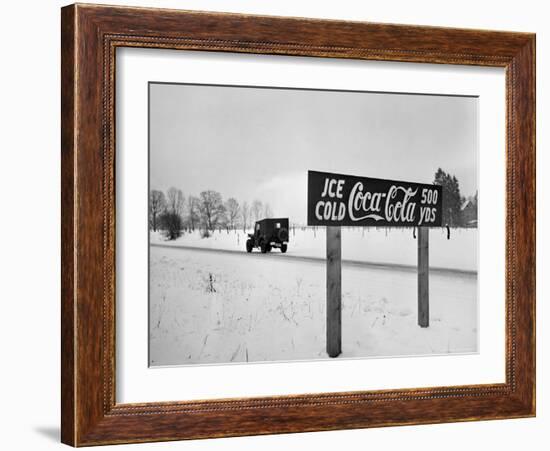 Coca Cola Road Sign on Autobahn Between Munich and Salzburg with Jep Driving-Walter Sanders-Framed Photographic Print