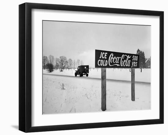 Coca Cola Road Sign on Autobahn Between Munich and Salzburg with Jep Driving-Walter Sanders-Framed Photographic Print