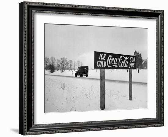 Coca Cola Road Sign on Autobahn Between Munich and Salzburg with Jep Driving-Walter Sanders-Framed Photographic Print