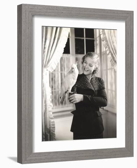 Cockatoo Perched on Woman's Hand-null-Framed Photo