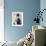 Cockatoo Perched on Woman's Hand-null-Framed Photo displayed on a wall