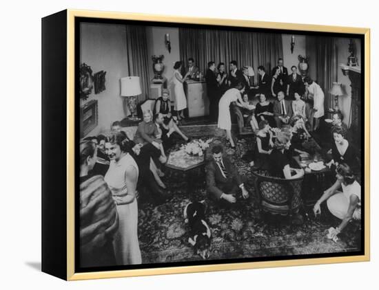 Cocktail Party in the Home of Mrs. R. Craig Montgomery-Yale Joel-Framed Premier Image Canvas
